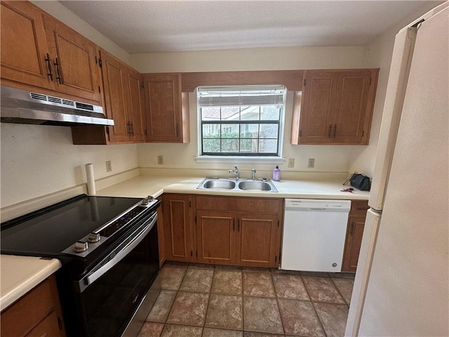 kitchen featuring white dishwasher, black range with electric stovetop, light countertops, a sink, and under cabinet range hood