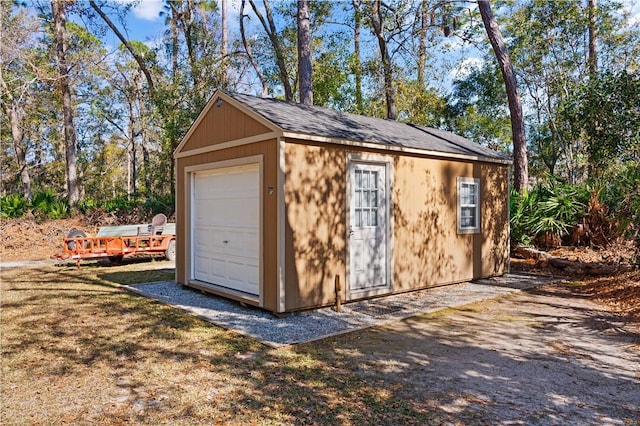 view of outdoor structure with a garage