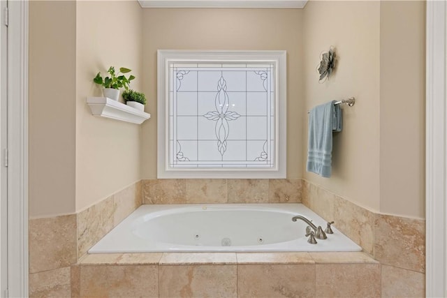 bathroom featuring a relaxing tiled tub