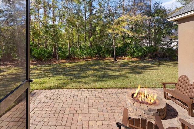 view of patio featuring a fire pit