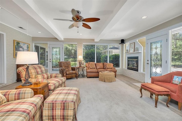 sunroom / solarium with beam ceiling and visible vents