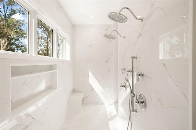 329 Saint Annies Ln, Saint Simons Island, GA 31522 - bathroom featuring a marble finish shower and healthy amount of natural light