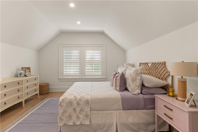 329 Saint Annies Ln, Saint Simons Island, GA 31522 - bedroom featuring light wood-style floors, vaulted ceiling, and recessed lighting