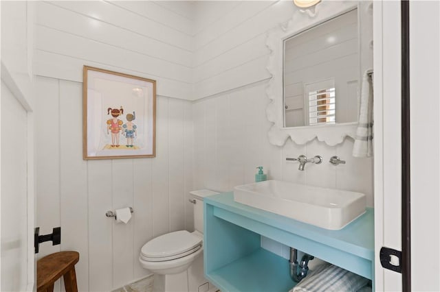 329 Saint Annies Ln, Saint Simons Island, GA 31522 - half bath with toilet and a sink