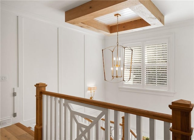 329 Saint Annies Ln, Saint Simons Island, GA 31522 - detailed view of a chandelier and beam ceiling