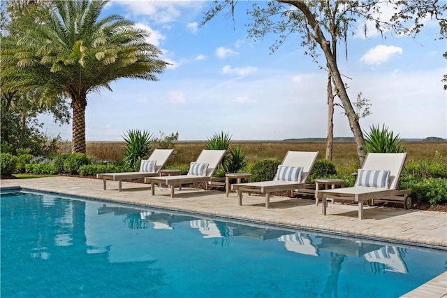 329 Saint Annies Ln, Saint Simons Island, GA 31522 - swimming pool featuring a patio area