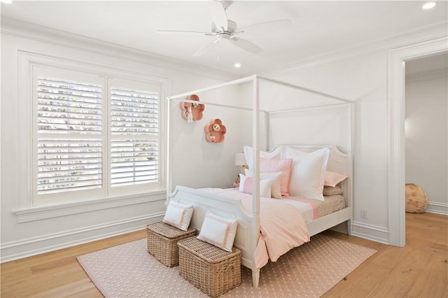 329 Saint Annies Ln, Saint Simons Island, GA 31522 - bedroom featuring wood finished floors, ornamental molding, a ceiling fan, and recessed lighting