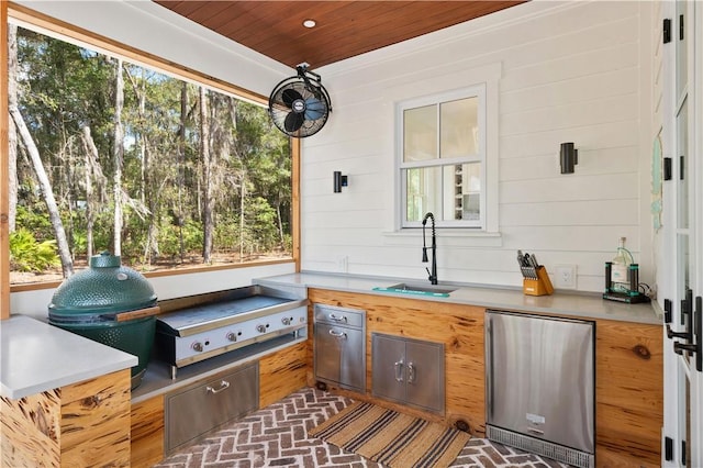 329 Saint Annies Ln, Saint Simons Island, GA 31522 - view of patio featuring a sink and an outdoor kitchen