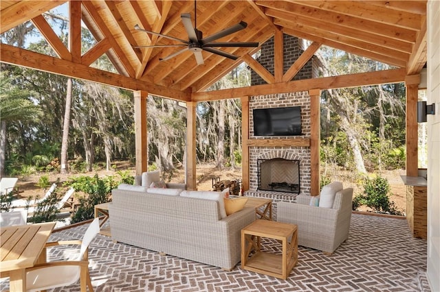 329 Saint Annies Ln, Saint Simons Island, GA 31522 - view of patio featuring a ceiling fan, a gazebo, and an outdoor living space with a fireplace