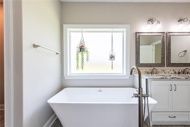 119 Silver Bluff Dr, Brunswick, GA 31523 - full bathroom featuring a freestanding bath and double vanity
