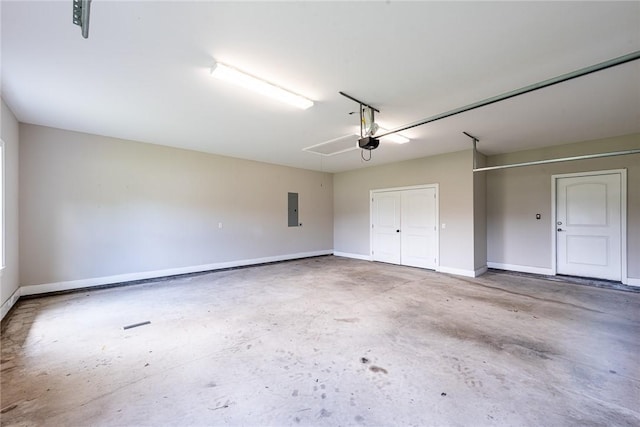 119 Silver Bluff Dr, Brunswick, GA 31523 - garage with electric panel and a garage door opener