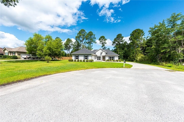 119 Silver Bluff Dr, Brunswick, GA 31523 - ranch-style house with a front yard and driveway