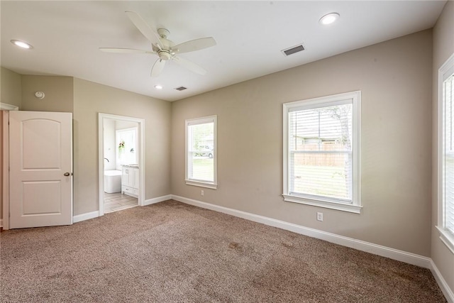 119 Silver Bluff Dr, Brunswick, GA 31523 - unfurnished bedroom with light colored carpet, ensuite bathroom, recessed lighting, and ceiling fan