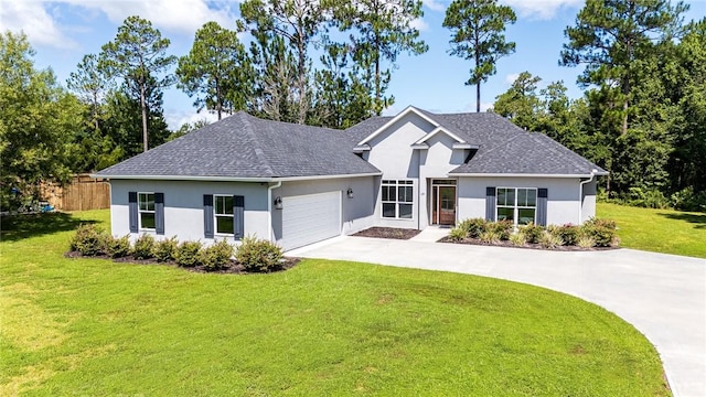 119 Silver Bluff Dr, Brunswick, GA 31523 - view of front of house featuring stucco siding, concrete driveway, an attached garage, and a shingled roof