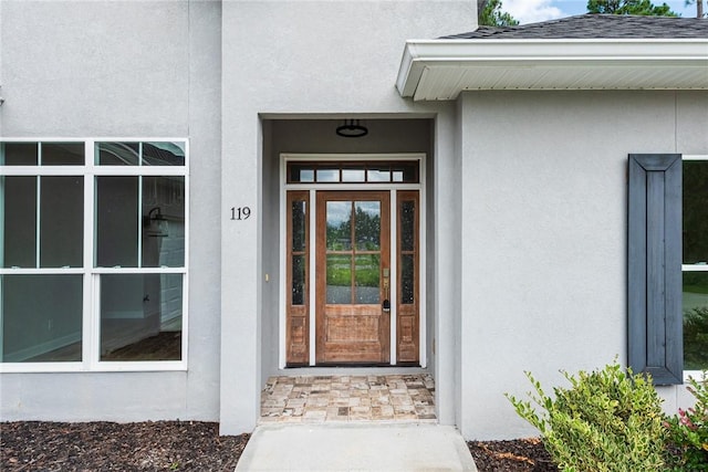 119 Silver Bluff Dr, Brunswick, GA 31523 - view of exterior entry with stucco siding