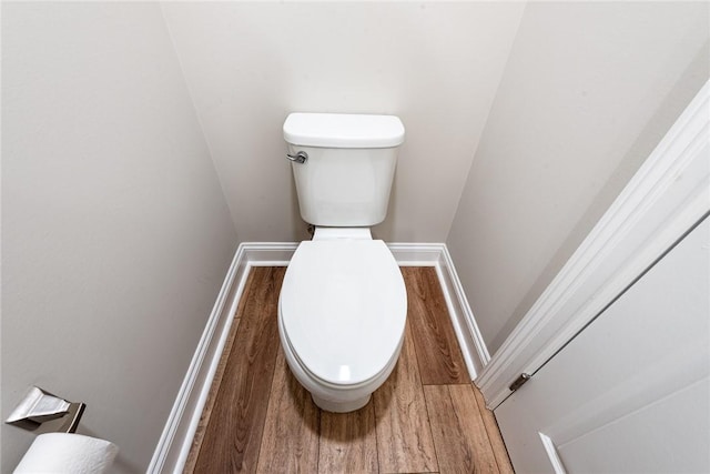 119 Silver Bluff Dr, Brunswick, GA 31523 - bathroom with toilet and wood finished floors