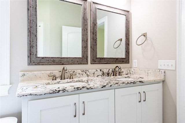 119 Silver Bluff Dr, Brunswick, GA 31523 - bathroom featuring double vanity and toilet