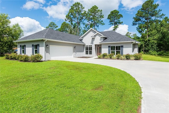 119 Silver Bluff Dr, Brunswick, GA 31523 - ranch-style house with stucco siding, concrete driveway, a front lawn, and a garage