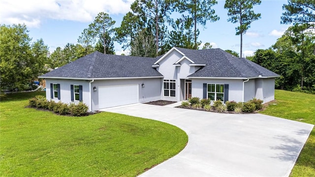 119 Silver Bluff Dr, Brunswick, GA 31523 - single story home featuring stucco siding, concrete driveway, a shingled roof, and a front yard