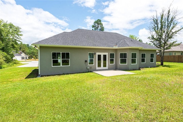 119 Silver Bluff Dr, Brunswick, GA 31523 - rear view of house featuring french doors, stucco siding, a patio, and roof with shingles