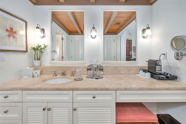 bathroom featuring vanity and wooden ceiling