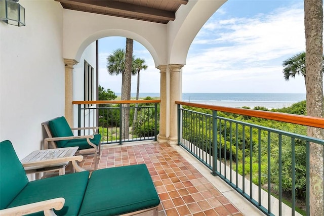 balcony featuring a water view