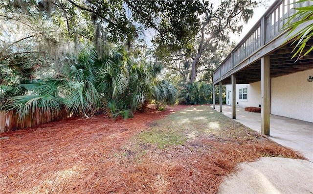 view of yard with a patio and a deck