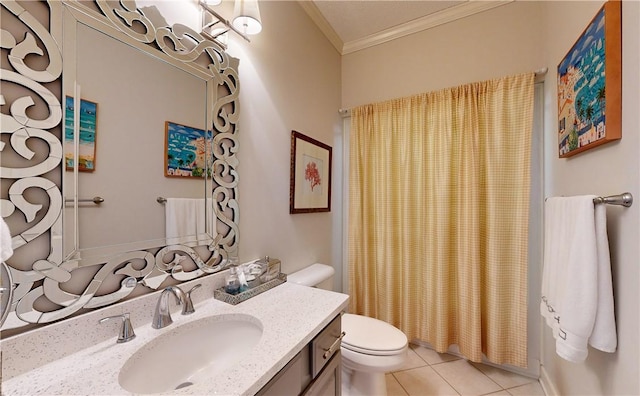 bathroom with tile patterned flooring, vanity, toilet, and ornamental molding