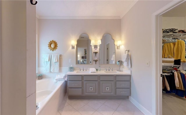 bathroom with tiled tub, crown molding, and vanity