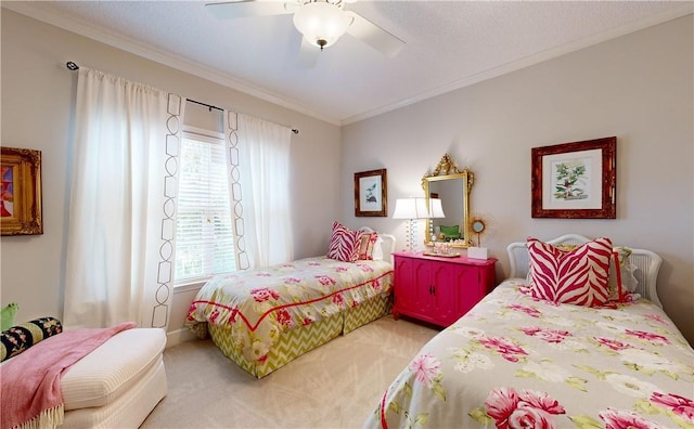 bedroom featuring carpet, ceiling fan, and crown molding