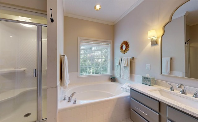 bathroom with vanity, separate shower and tub, and crown molding