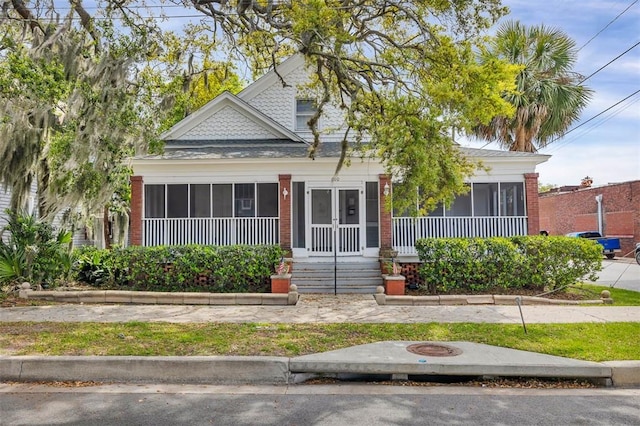 view of front of house featuring brick siding