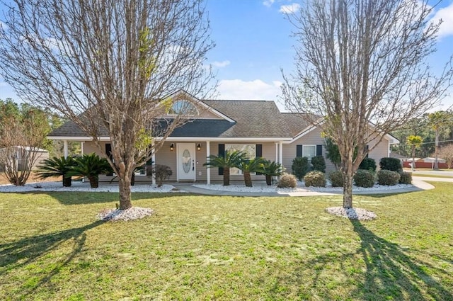 ranch-style house with a front lawn