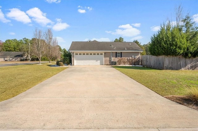 view of front of home with a garage and a front lawn