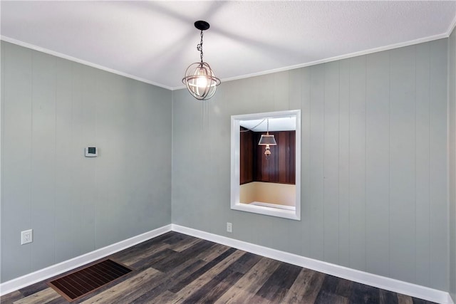 1069 Shellman Hammock Dr NE, Townsend, GA 31331 - unfurnished room with dark wood finished floors, crown molding, and baseboards
