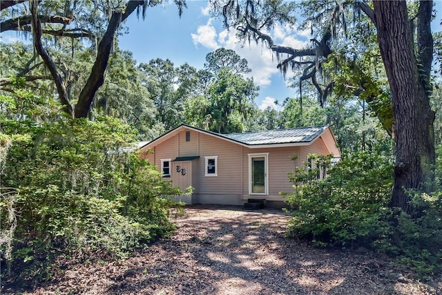 1069 Shellman Hammock Dr NE, Townsend, GA 31331 - back of property with metal roof