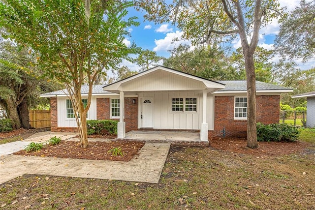 ranch-style house with a porch