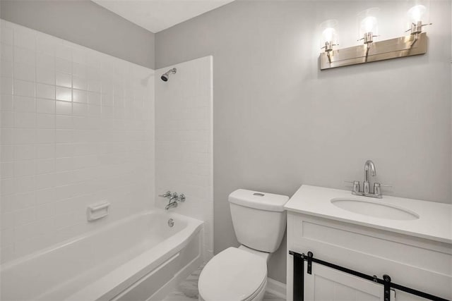 full bathroom featuring vanity, toilet, and tiled shower / bath