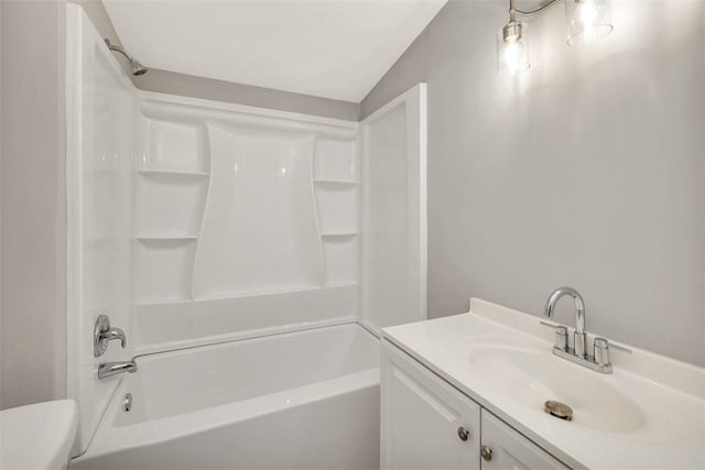 full bathroom with shower / washtub combination, vanity, and toilet