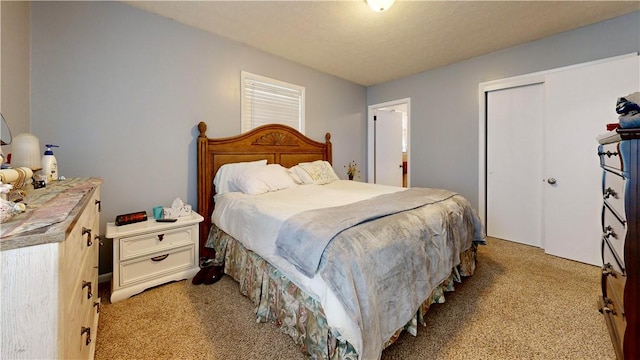 1703 Rainbow Dr, Waycross, GA 31501 - bedroom featuring light colored carpet and a closet
