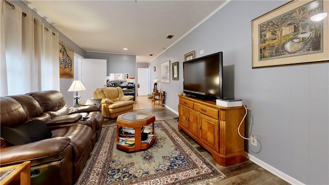 1703 Rainbow Dr, Waycross, GA 31501 - living room with wood finished floors and crown molding