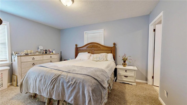 1703 Rainbow Dr, Waycross, GA 31501 - bedroom with light colored carpet