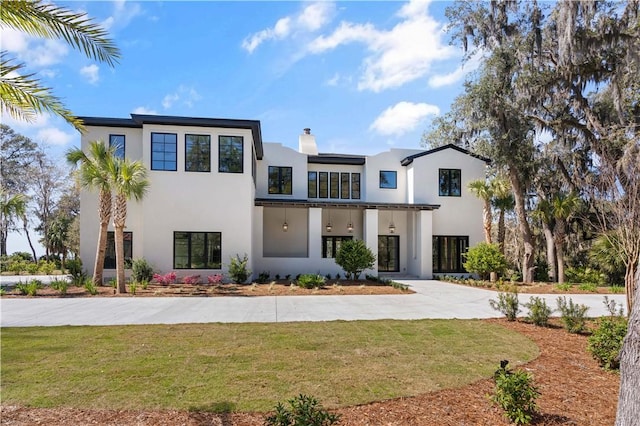 view of front of home with a front yard