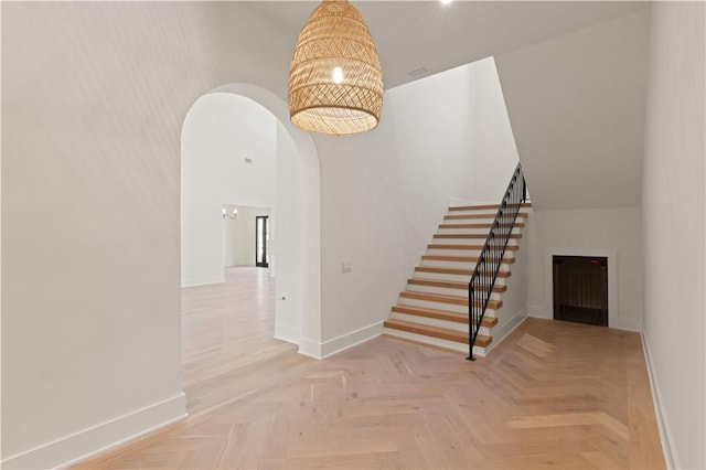 staircase with parquet floors