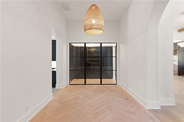 hall featuring light parquet floors