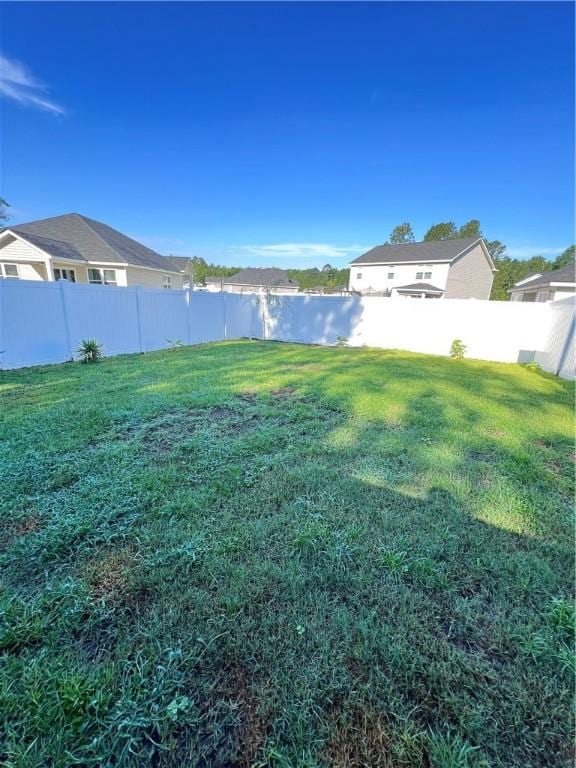 10003 Woodland Cv, Brunswick, GA 31525 - view of fenced backyard