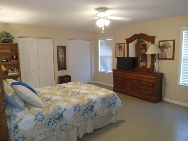 685 Chapel Crossing Rd, Brunswick, GA 31525 - bedroom with two closets, light colored carpet, and a ceiling fan