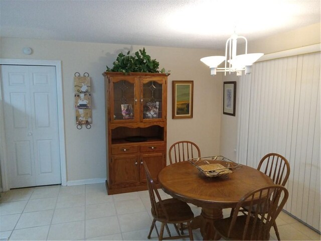 685 Chapel Crossing Rd, Brunswick, GA 31525 - dining space featuring a chandelier and light tile patterned flooring