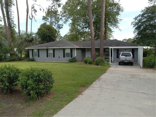 685 Chapel Crossing Rd, Brunswick, GA 31525 - ranch-style house featuring asphalt driveway and a front lawn