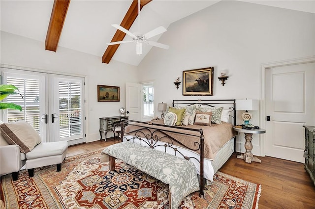 bedroom with access to outside, french doors, hardwood / wood-style flooring, ceiling fan, and beamed ceiling